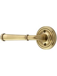 Classic Rosette Door Set with Merrimack Levers Left Handed in Antique Brass.